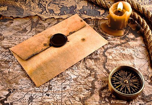letter candle cord old compass map