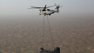 Canadian forces, us marines lift damaged chinook to safety
