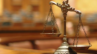 Decorative scales of justice in the courtroom
