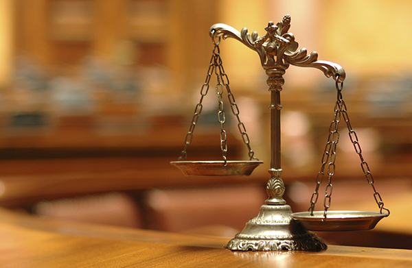Decorative scales of justice in the courtroom
