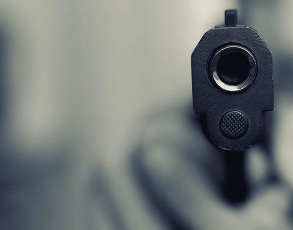 Pistol gun close up blur